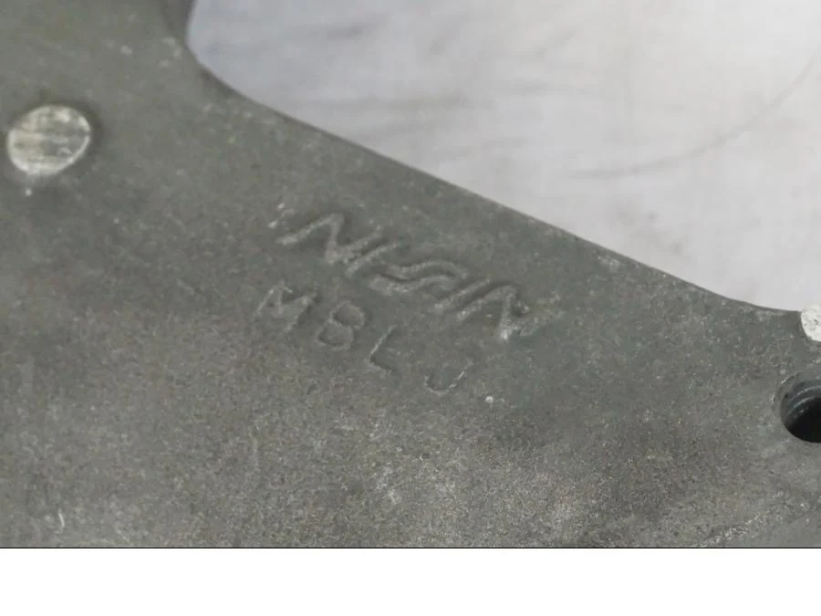 Držák brzdového třmenu Honda
