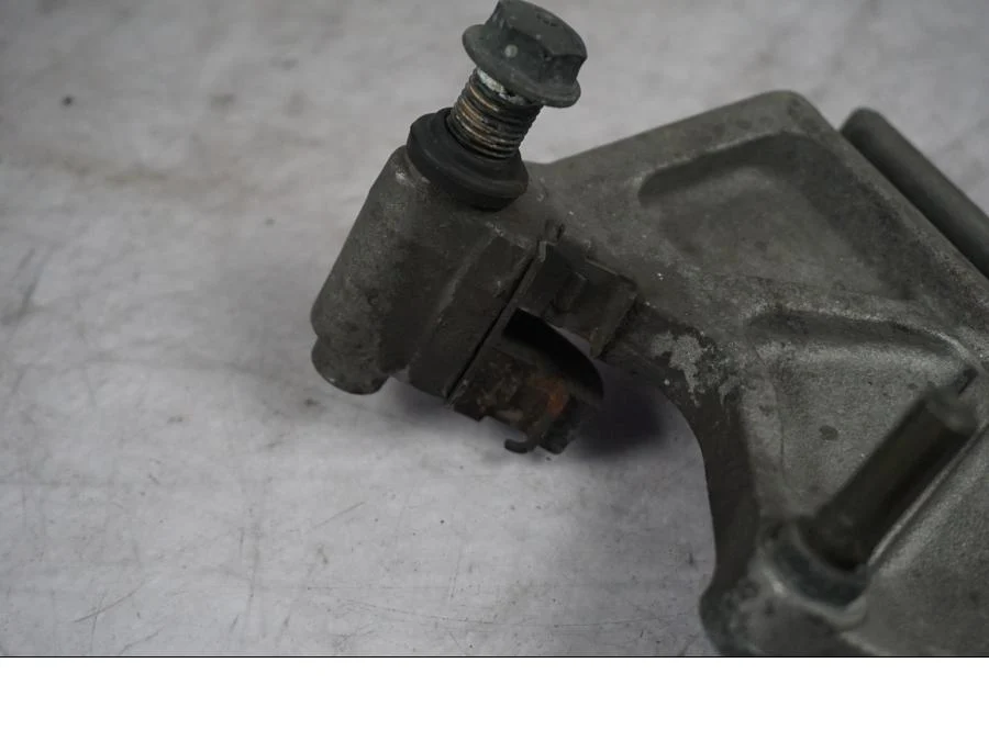 Držák brzdového třmenu Honda