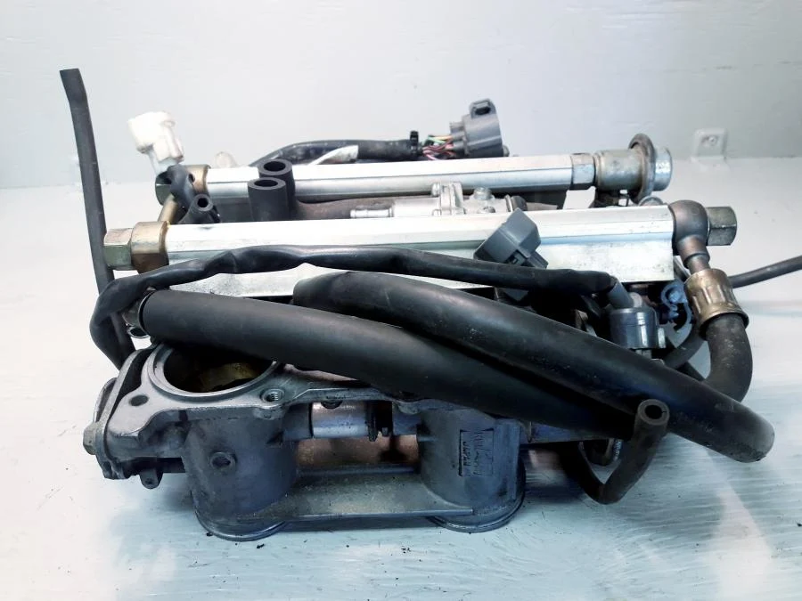 Těleso škrticí klapky Honda