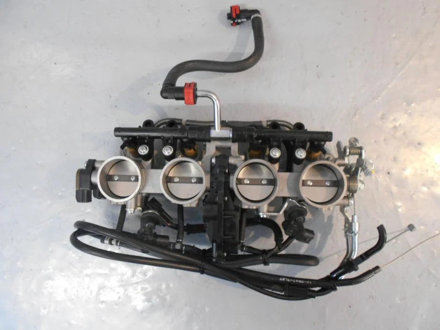 Těleso škrticí klapky Kawasaki