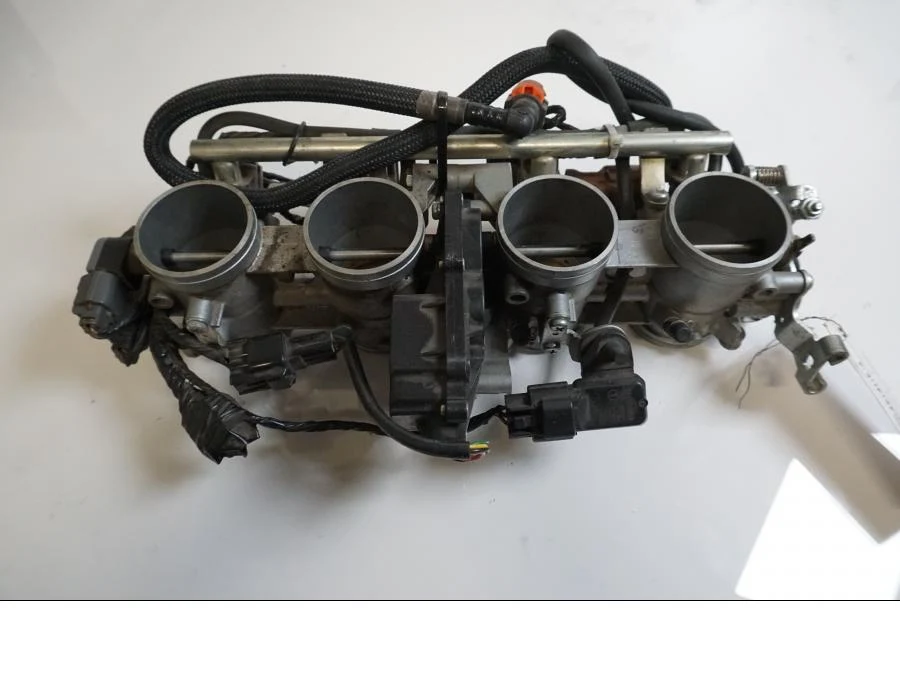 Těleso škrticí klapky Kawasaki