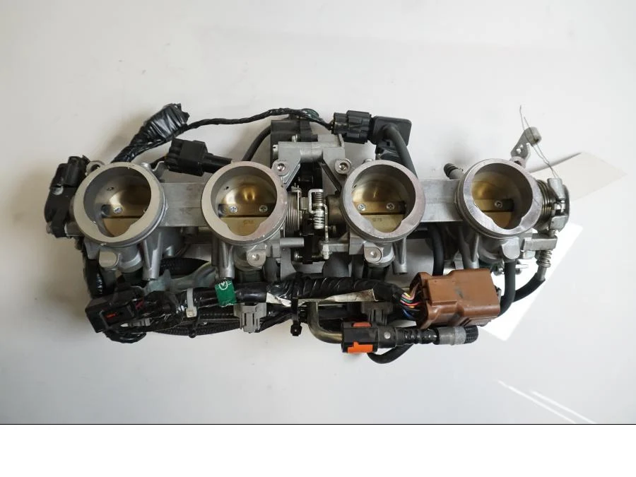 Těleso škrticí klapky Kawasaki