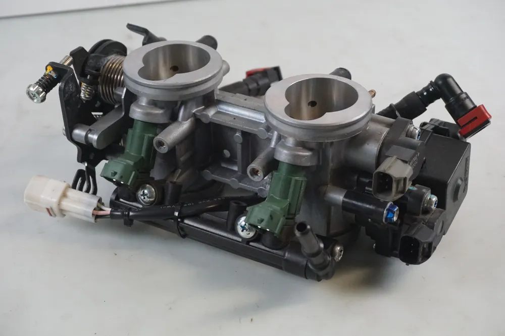 těleso škrticí klapky Kawasaki