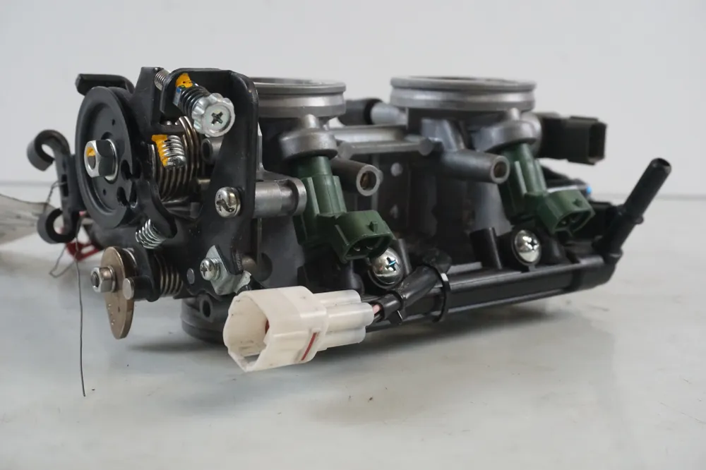 těleso škrticí klapky Kawasaki