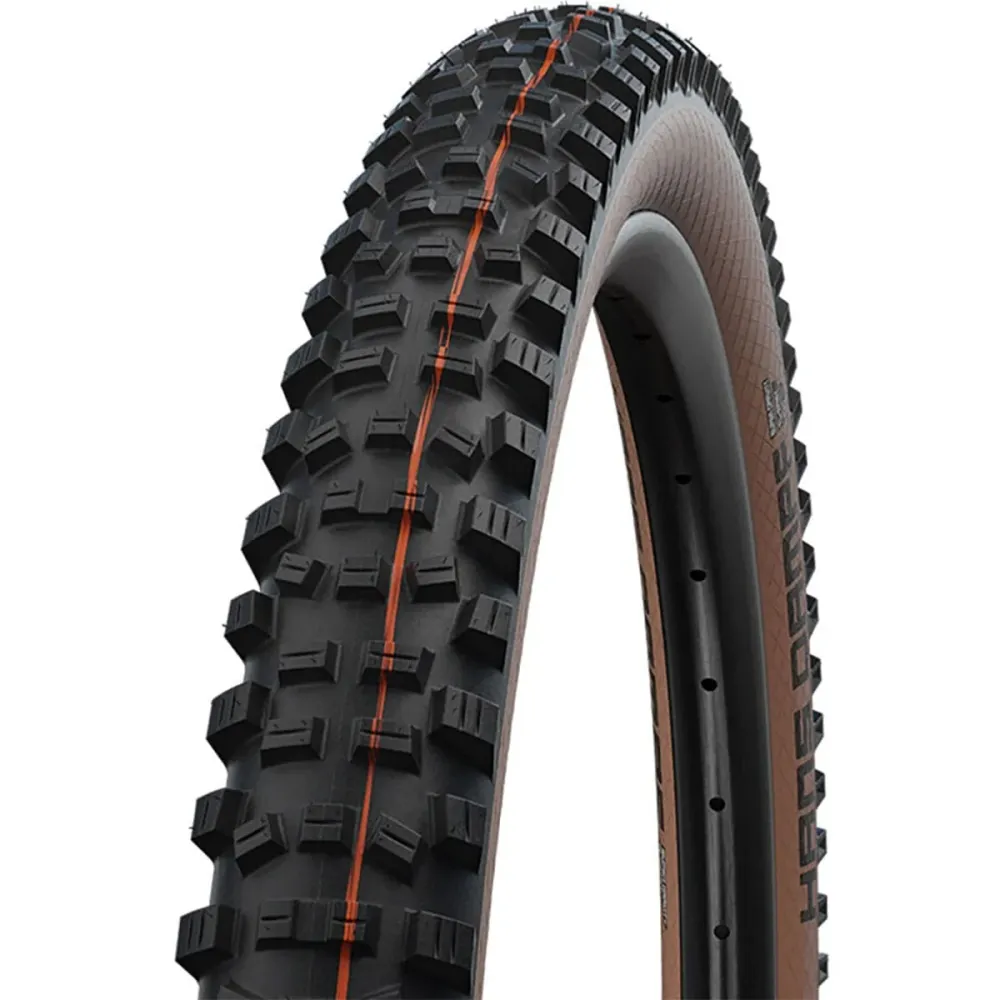 SCHWALBE HANS DAMPF 29x2.35 ADDIX SOFT SUPERTRAIL bezdušová pneumatika Soft Black/Brown