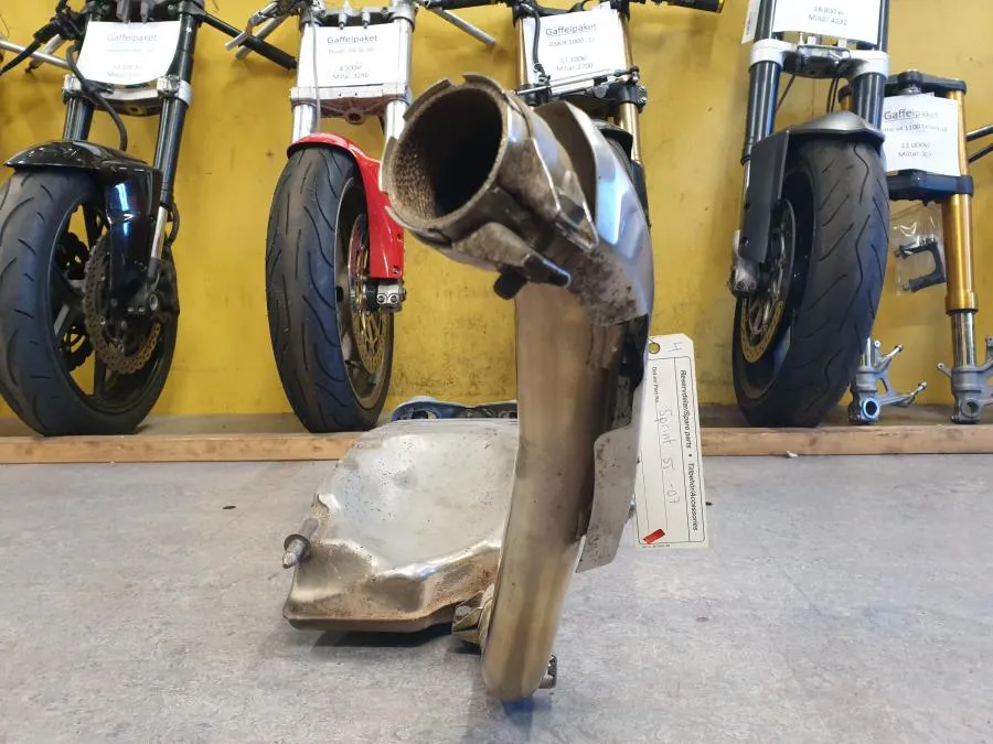 Výfukový tlumič Triumph