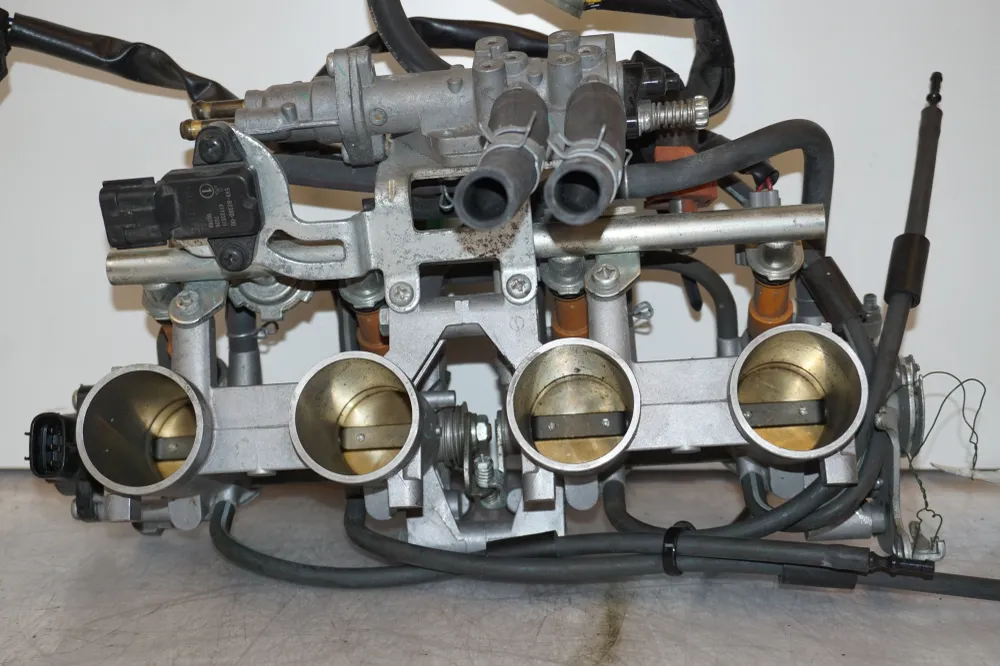 škrticí těleso Yamaha