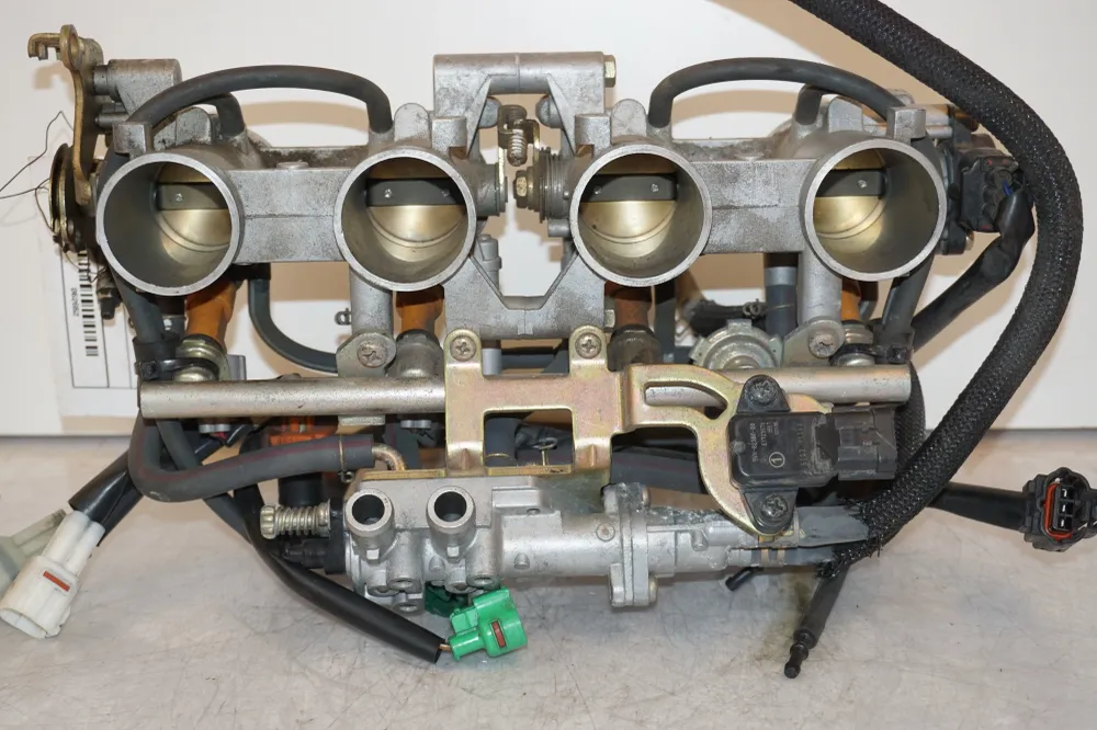 Škrticí těleso Yamaha